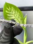 front view of baguette and round diamond tennis bracelet