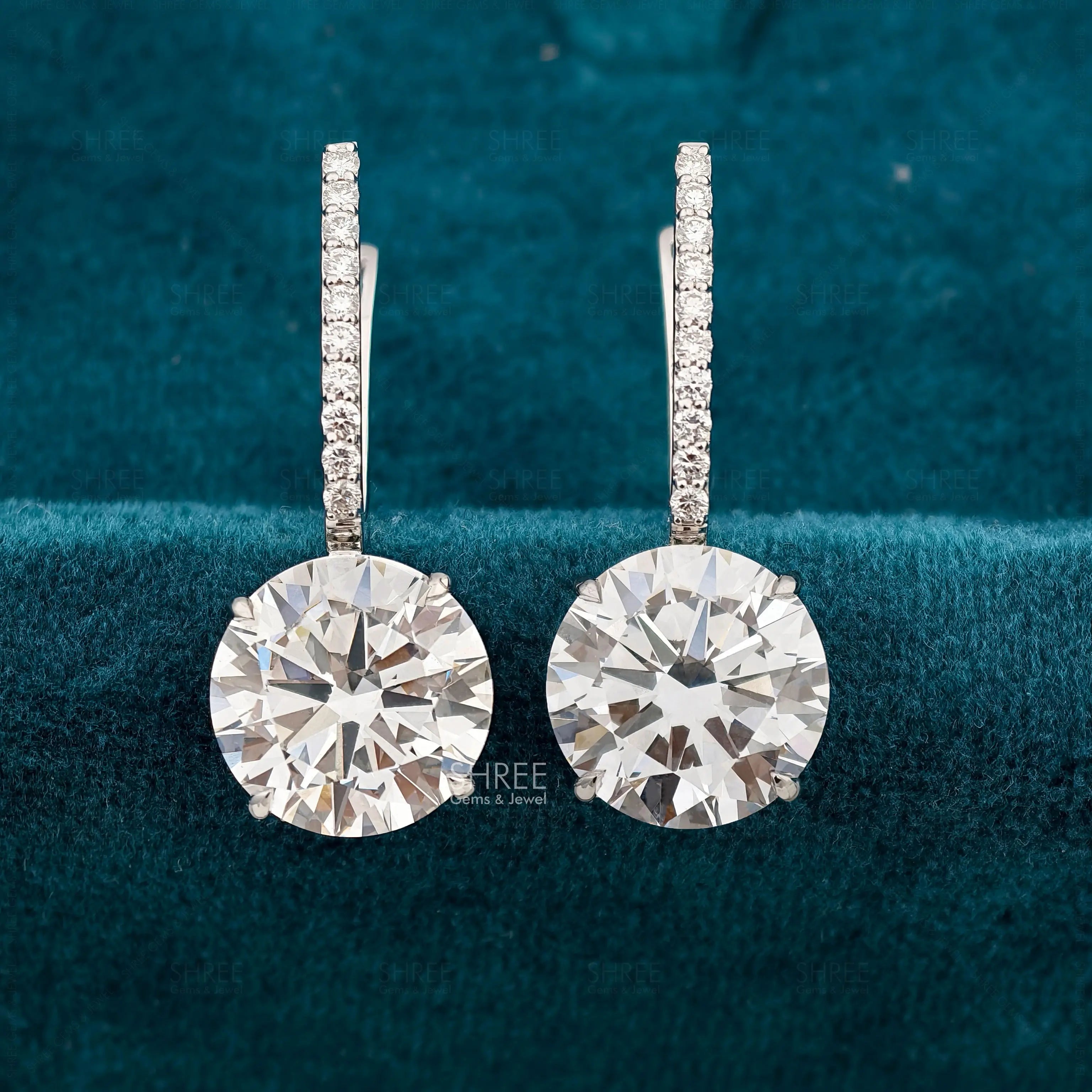 front view of diamond dangle drop earrings​