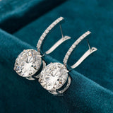side view of dangle diamond earrings for women​
