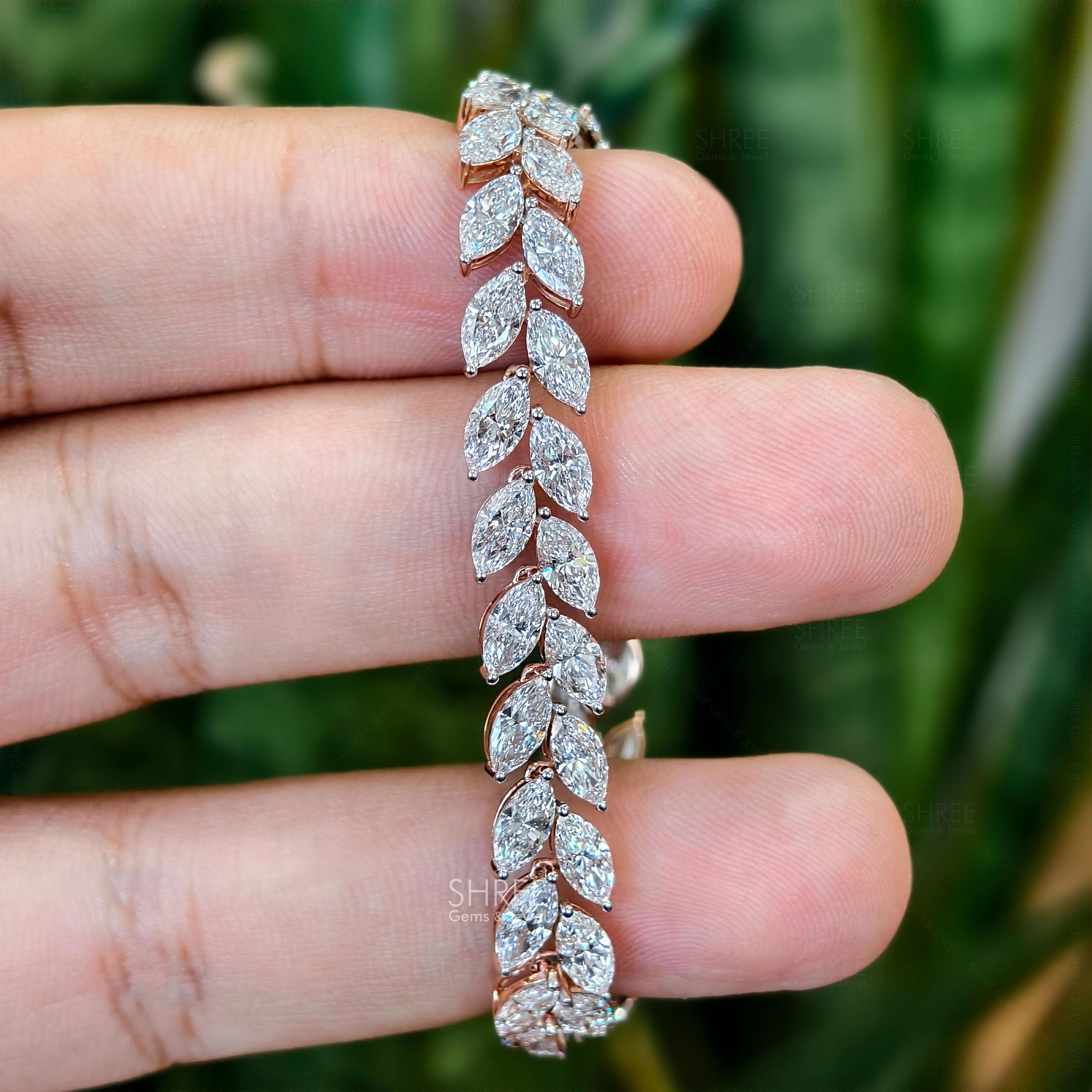 in hand view of lab grown diamond tennis bracelet​
