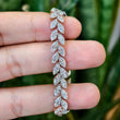 in hand view of lab grown diamond tennis bracelet​
