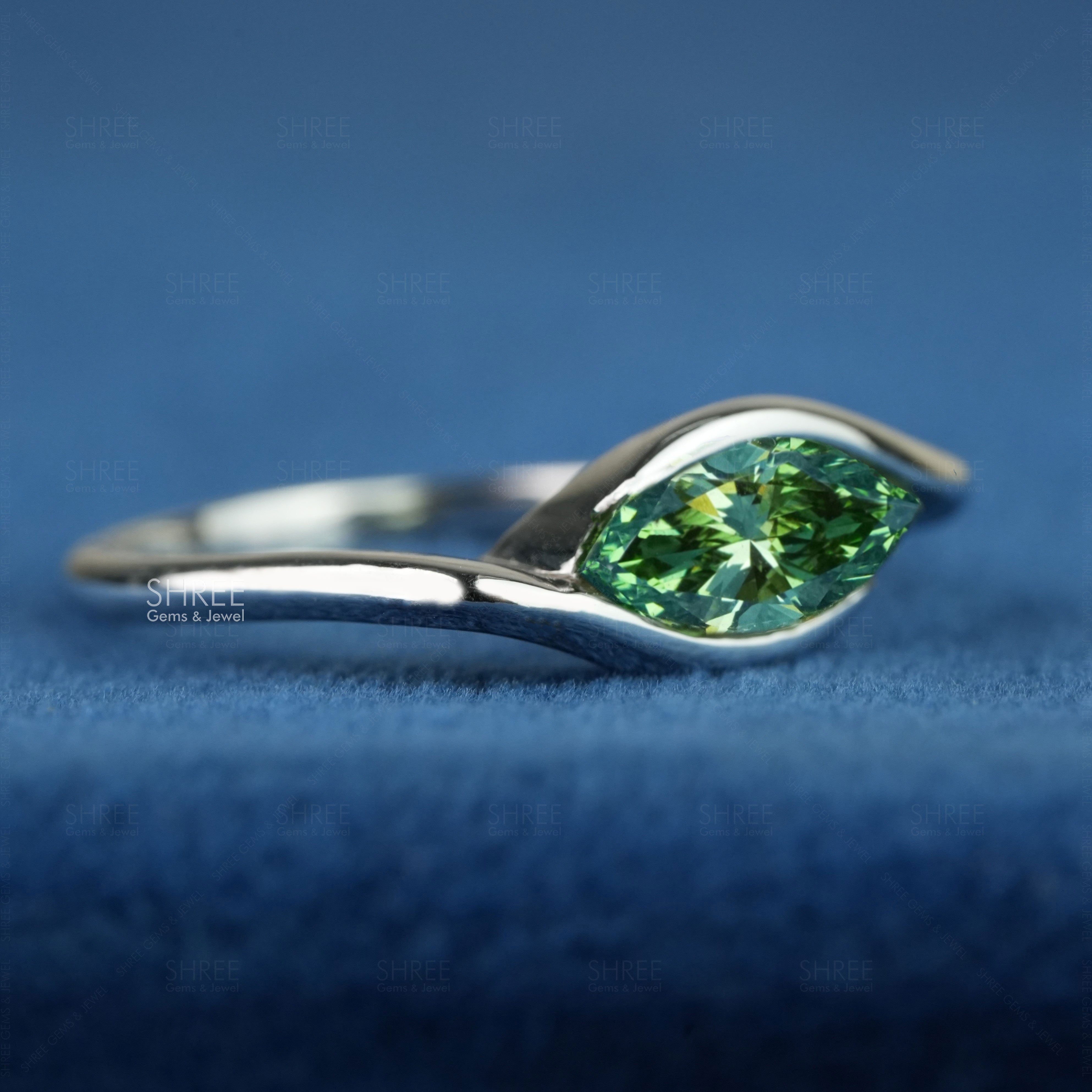side view of 1 carat marquise diamond ring​
