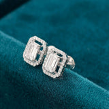 side view of 1 carat emerald cut diamond stud earrings​
