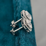 back view of 1 carat emerald cut diamond earrings​
