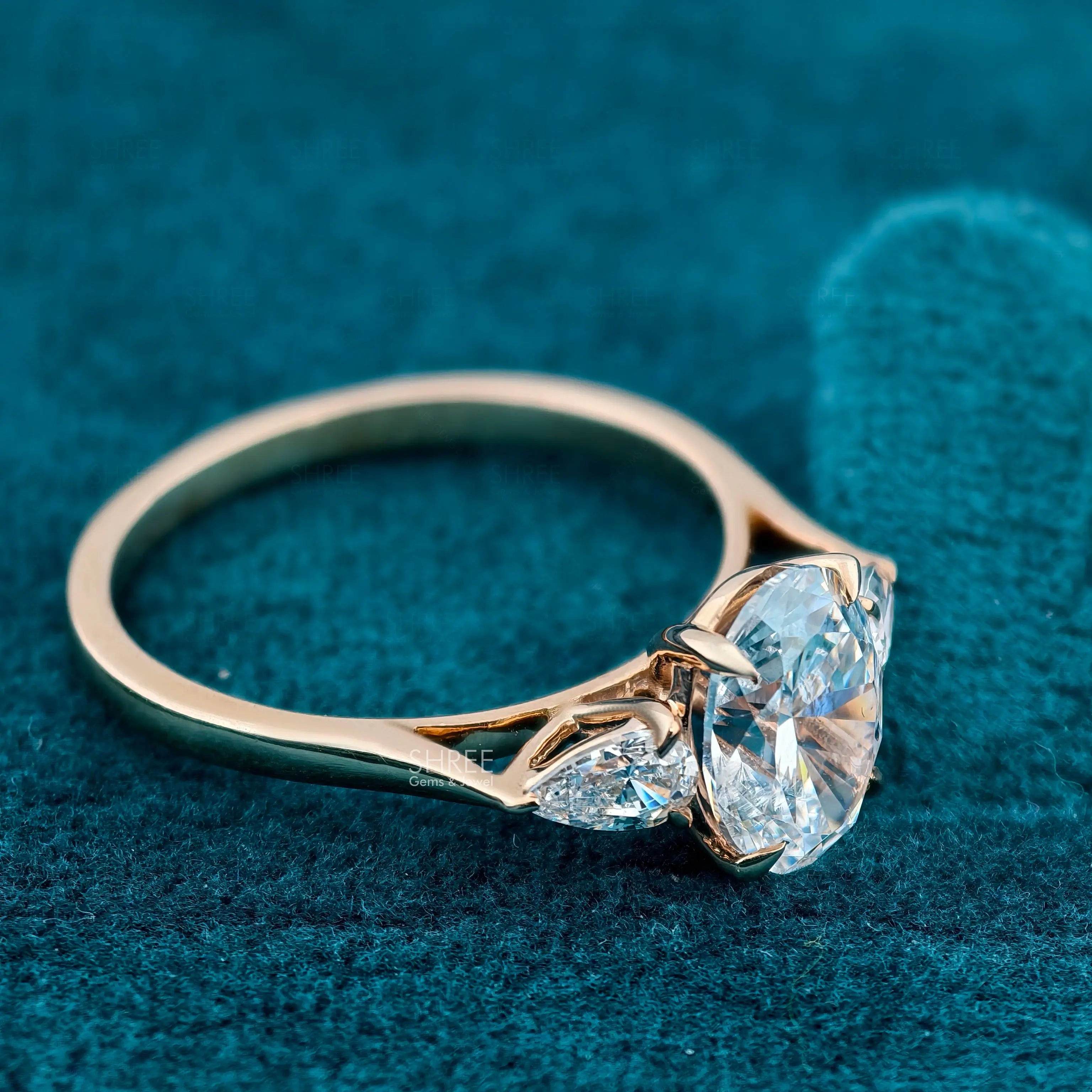 Underside View of 1 Ct Oval Lab Diamond Three Stone Engagement Ring with Pear Side Stone