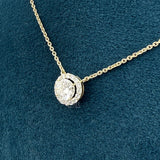 side view of diamond halo necklace​

