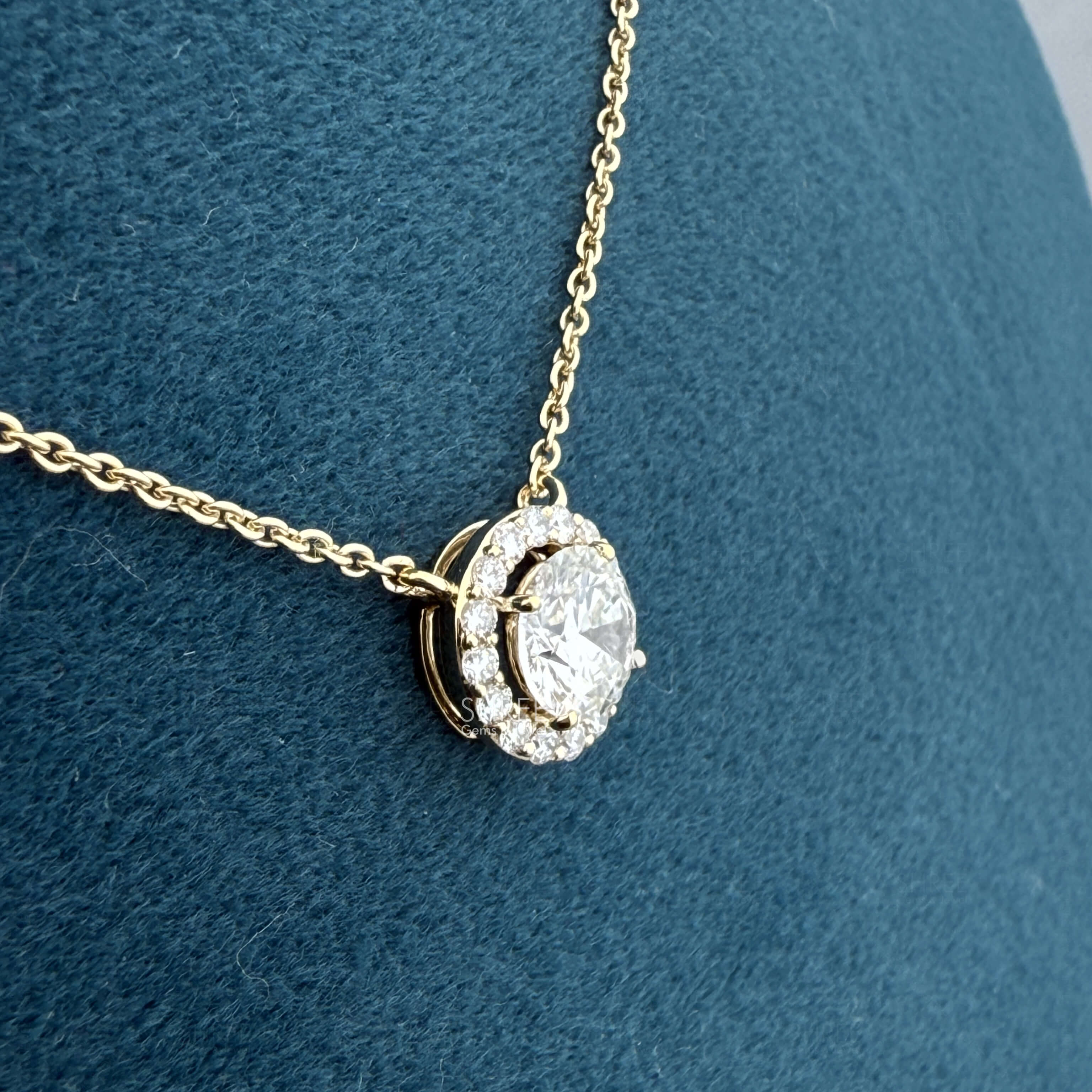 side view of diamond halo pendant necklace​
