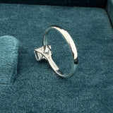 back metal view of 1 ct solitaire unique emerald cut diamond rings
