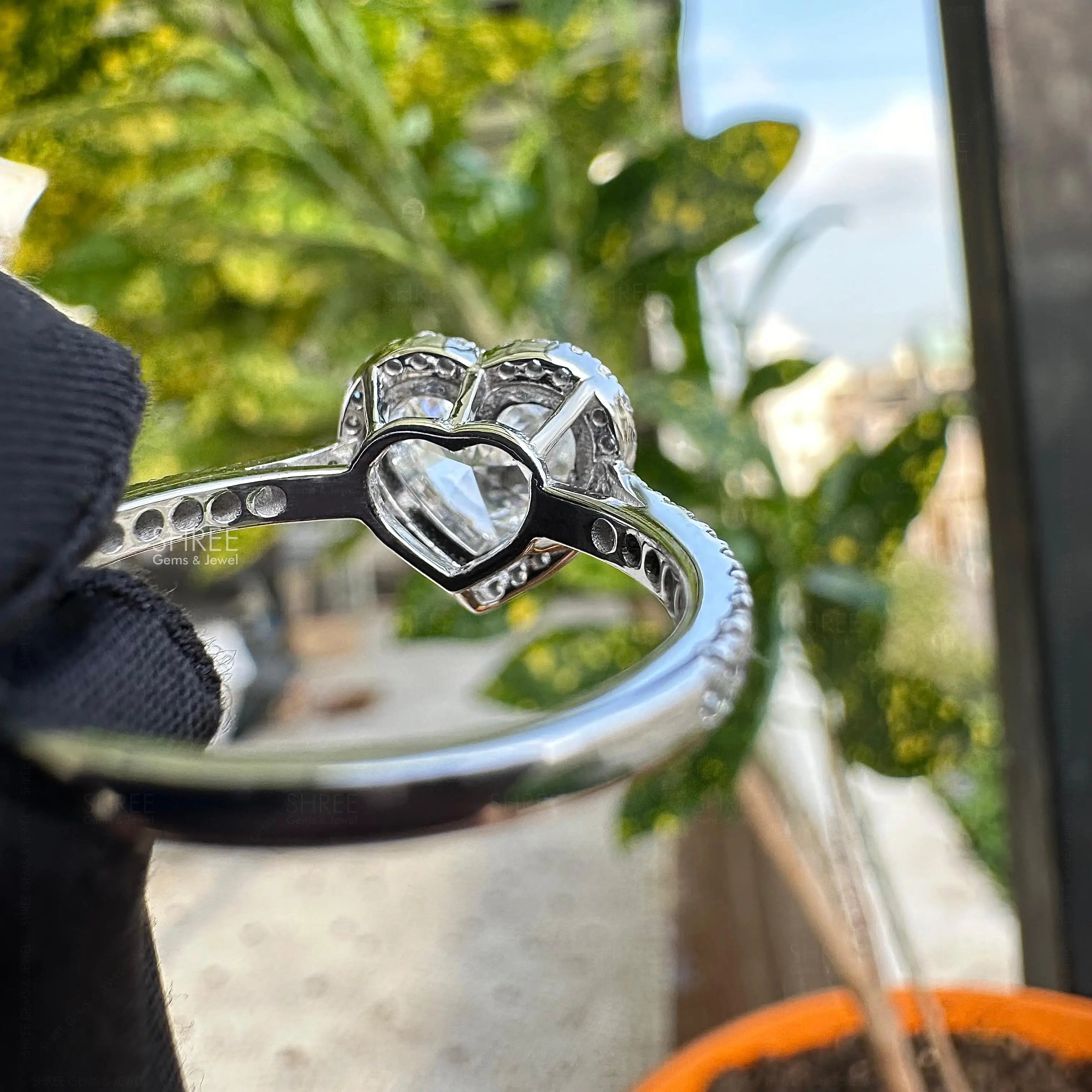 back view of heart cut diamond engagement rings​
