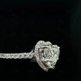 Side view of engagement rings with diamond halo
