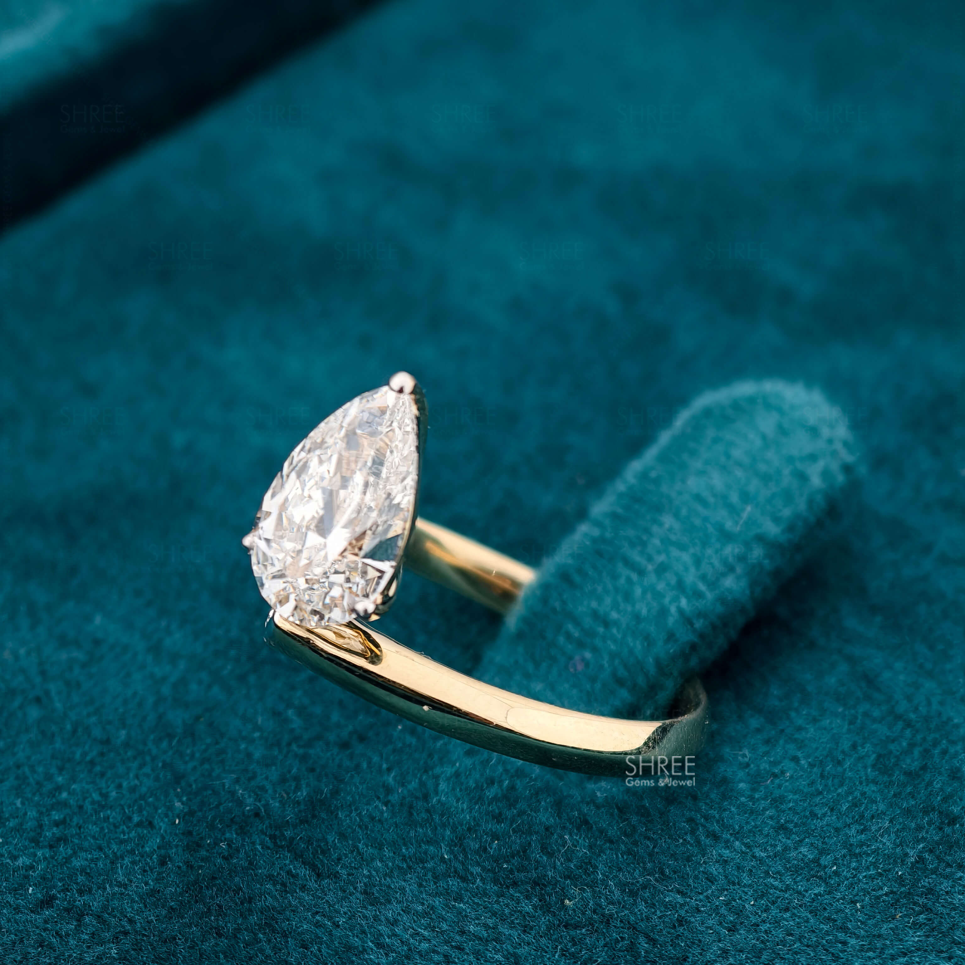 Side View of 2 Carat Pear Shaped Lab Diamond Bypass Ring