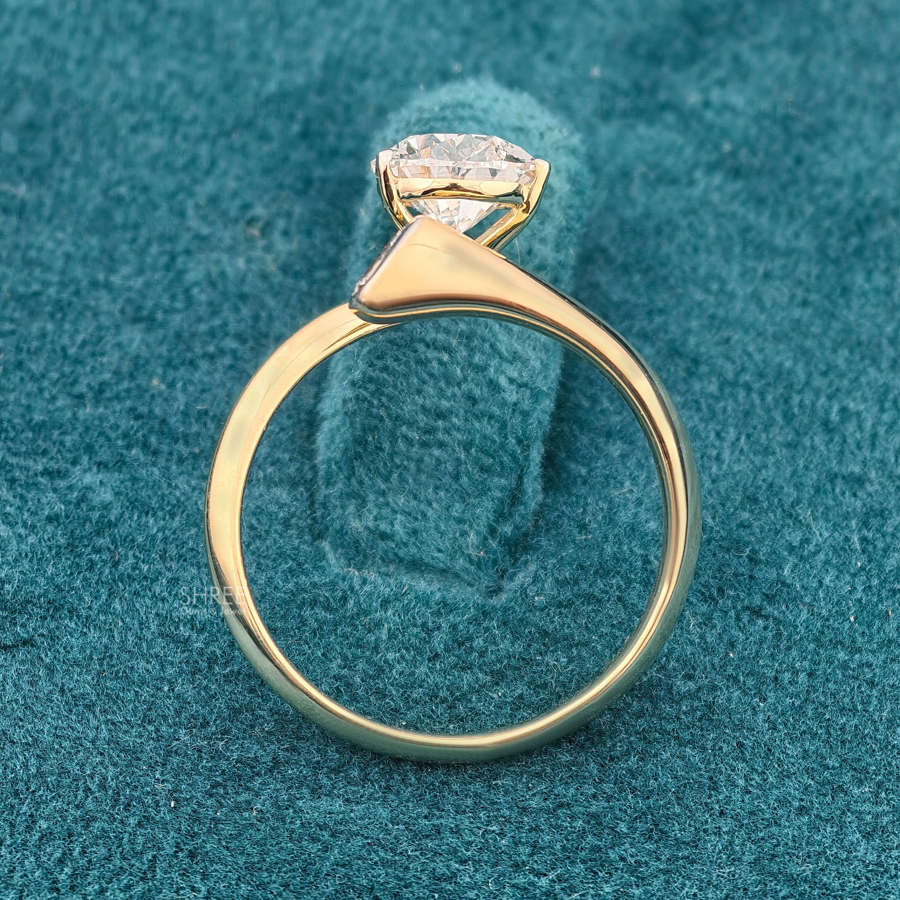 Full Band View of 2 Carat Pear Shaped Lab Diamond Bypass Ring