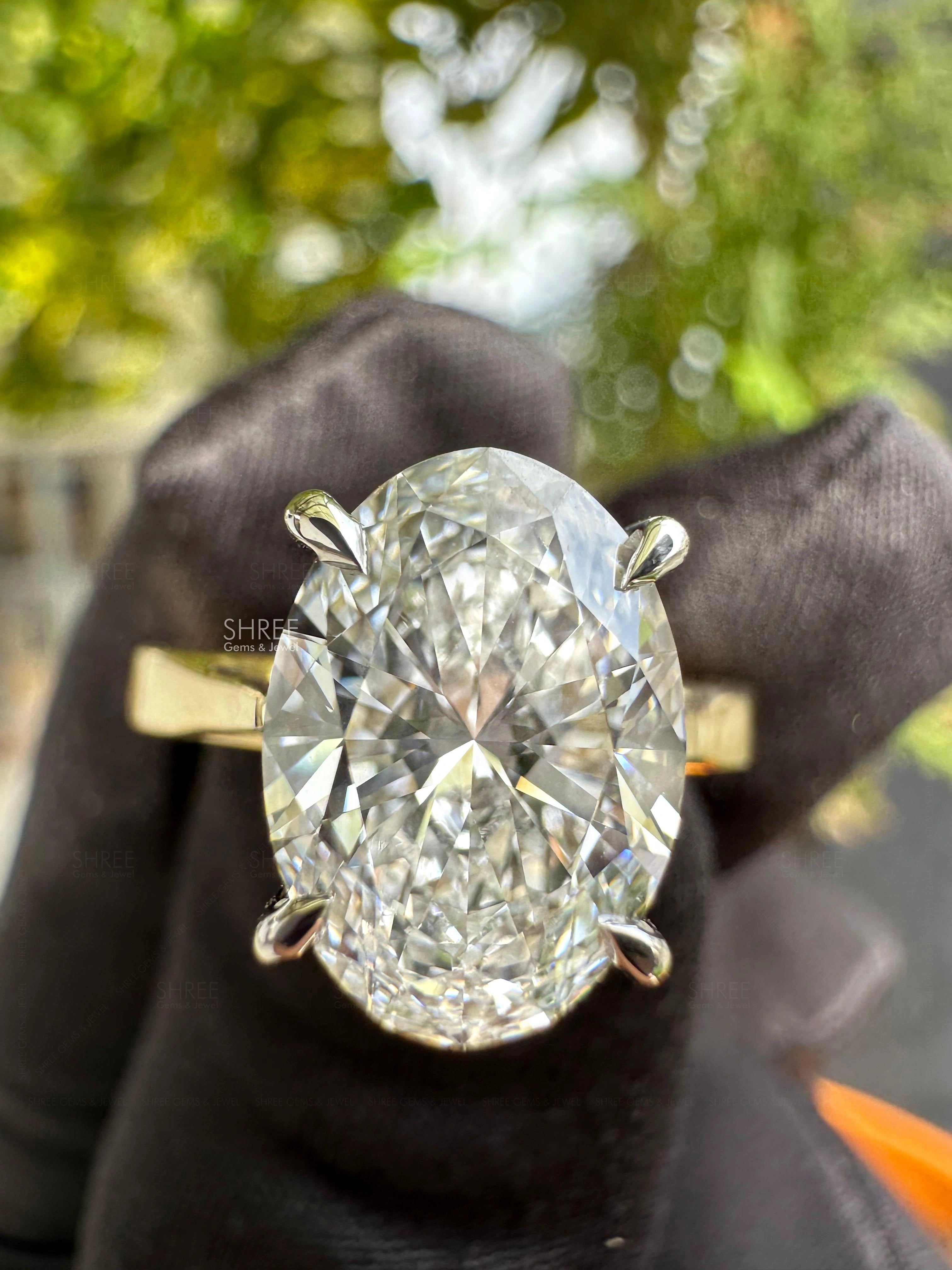 Front View of Lab Created Oval Diamond Engagement Rings​