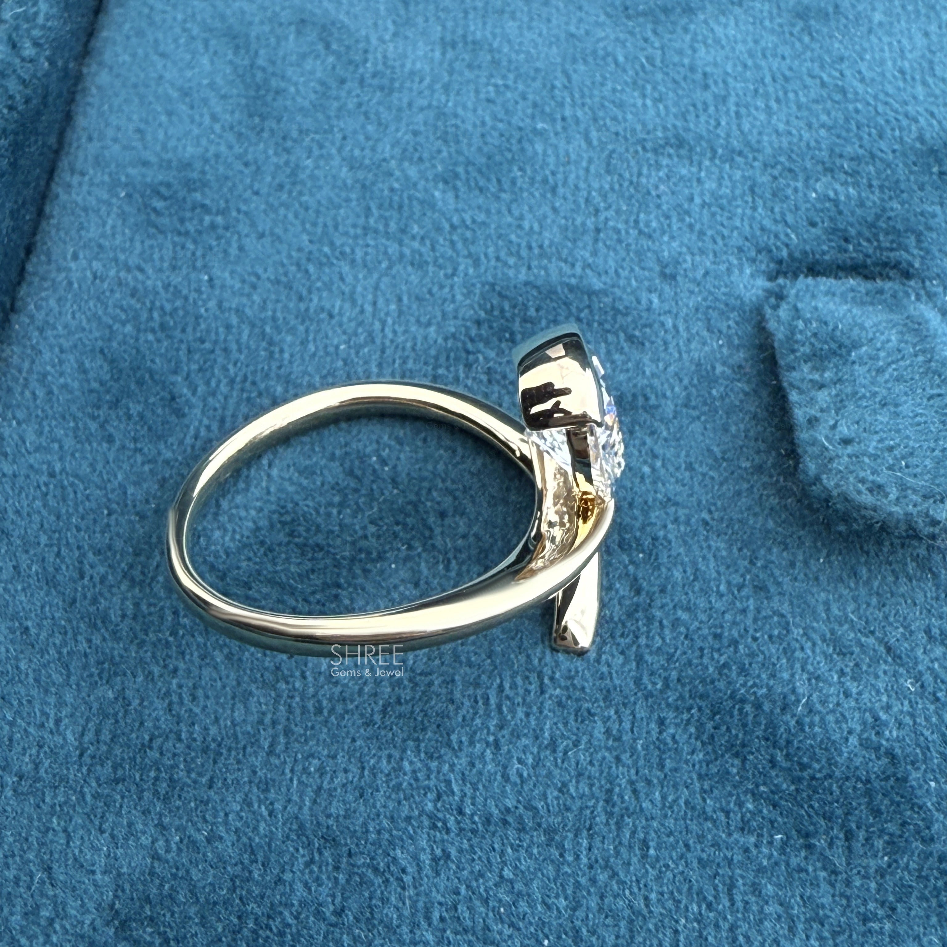 top view of 2 ct pear shape diamond engagement ring
