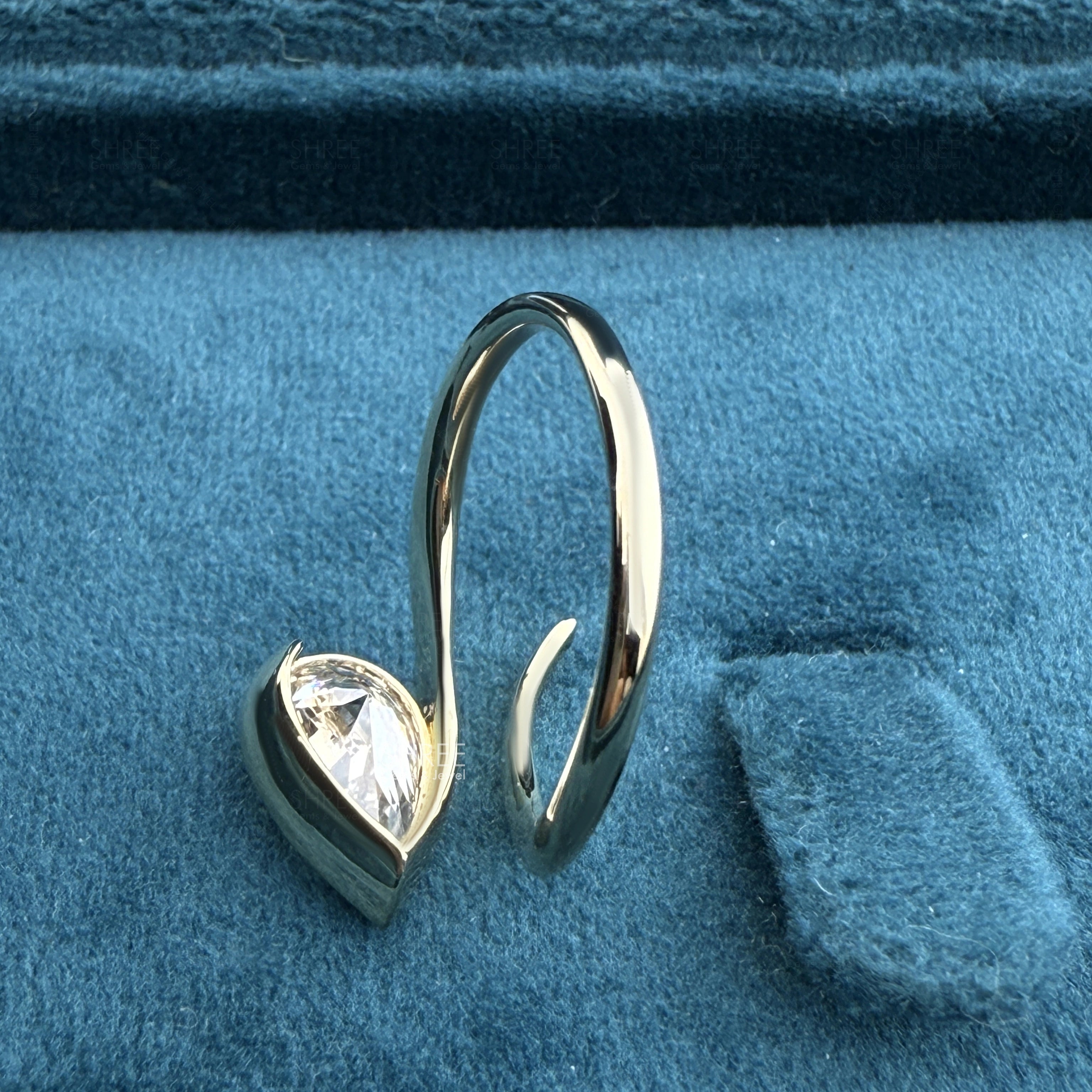 back view of 2ct pear shaped diamond engagement rings​
