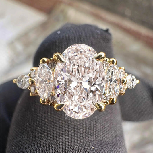front view of oval and marquise diamond ring 