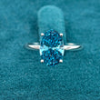 Front view of 3 Carat Fancy Blue Oval Hidden Halo Engagement Ring