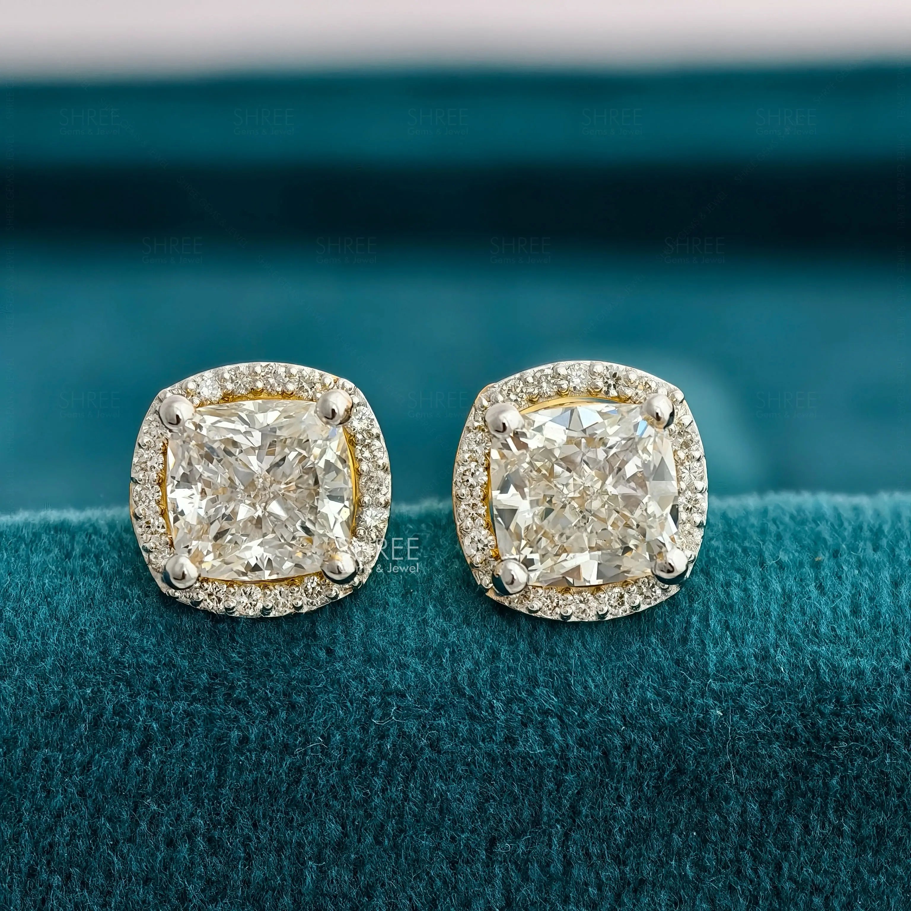 front view of cushion cut diamond earrings​