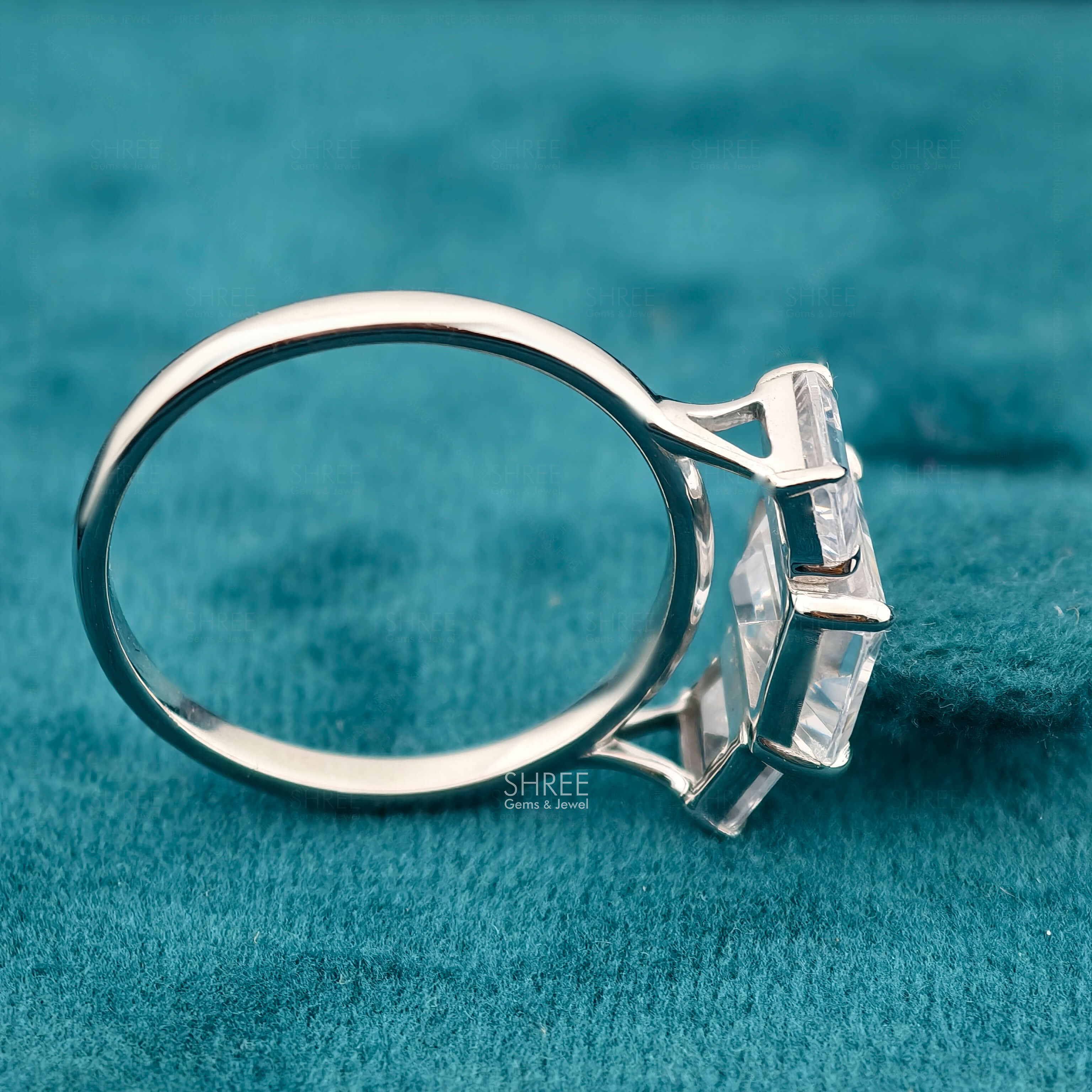 SIde view of 3 Ct Emerald Cut Three Stone Lab Diamond Ring