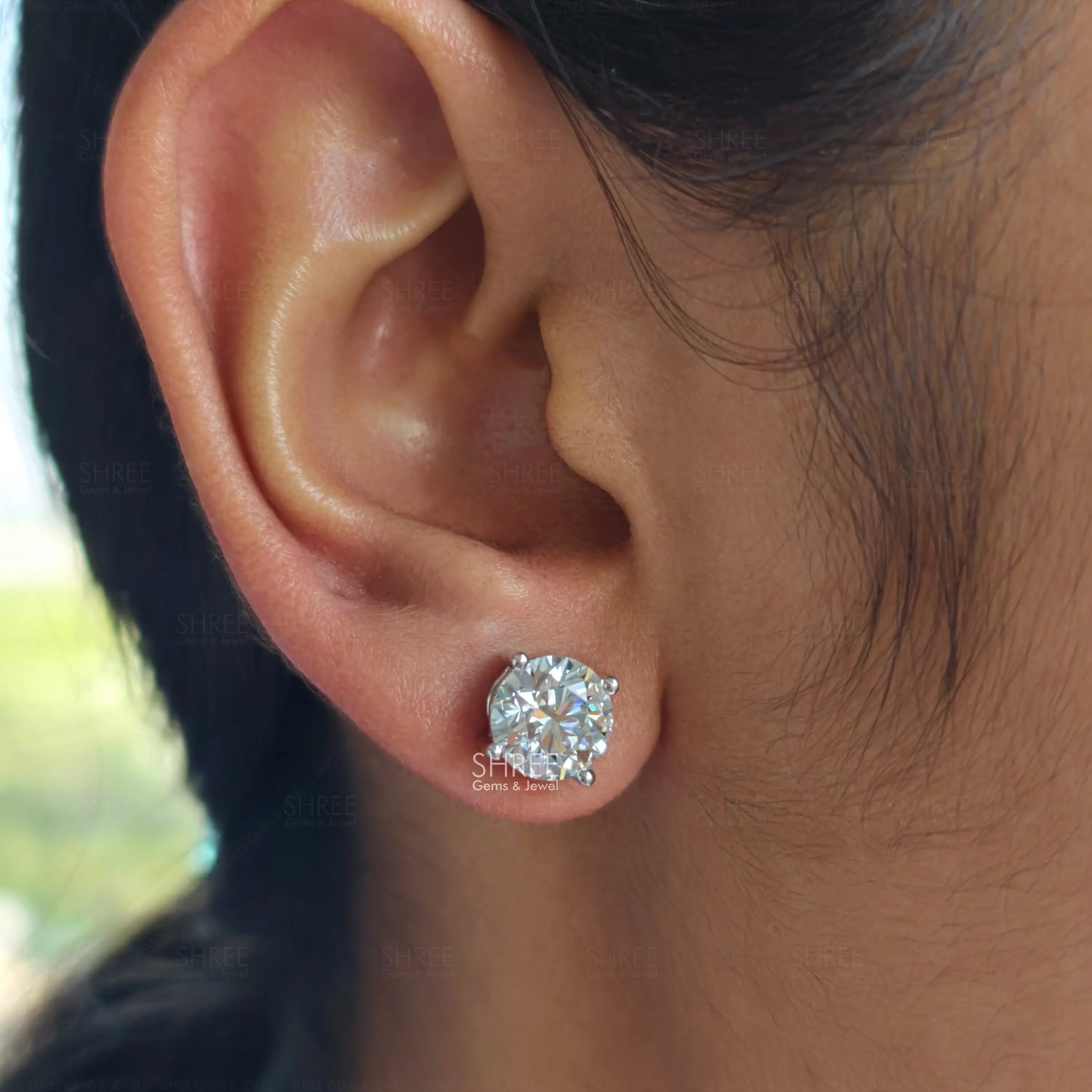 Woman Wearing 3 Ct Round Cut Lab Grown Diamond Stud Earring