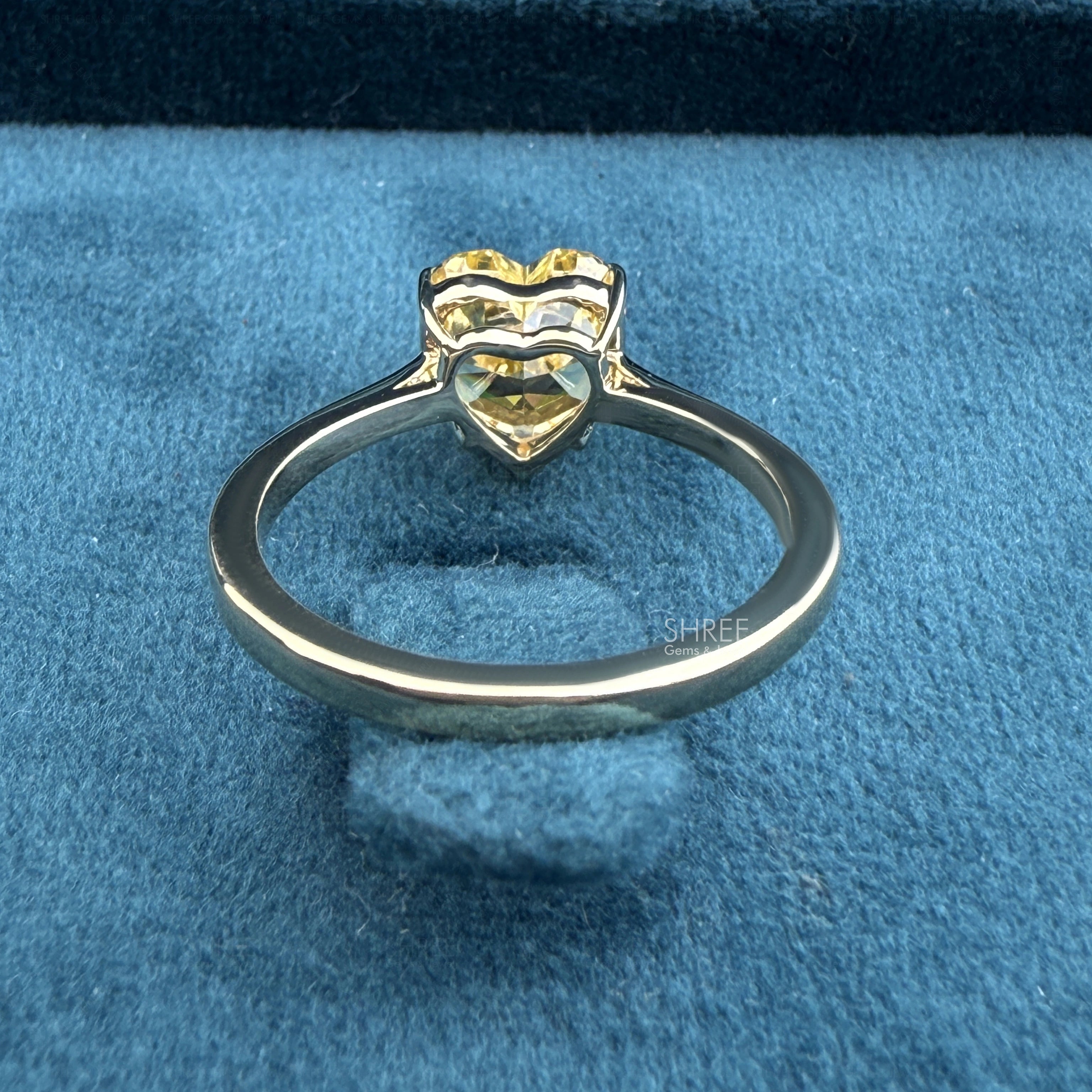 back view of lab grown yellow diamond ring
