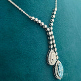 side view of colorful diamond necklace​