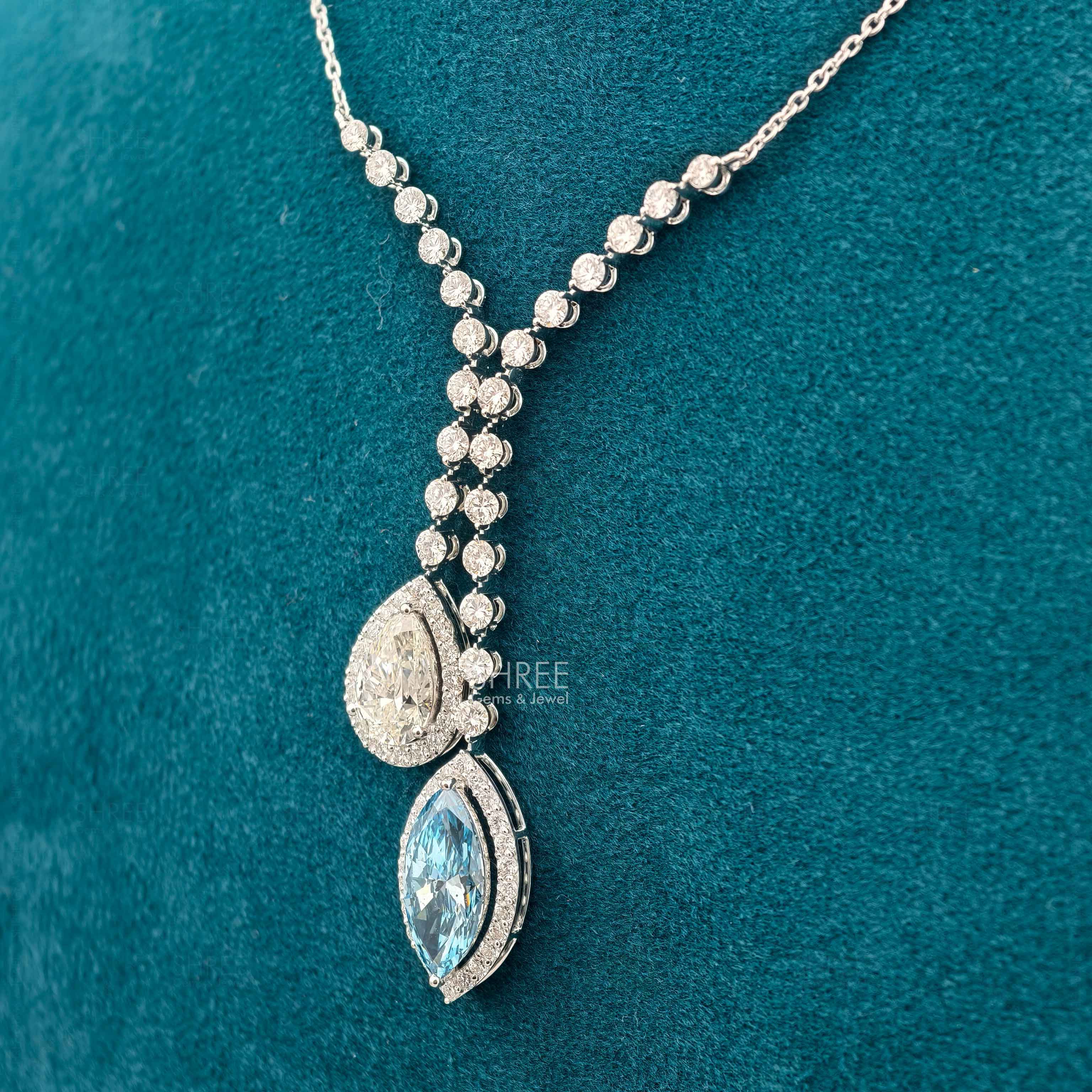 side view of pear shape diamond necklace​

