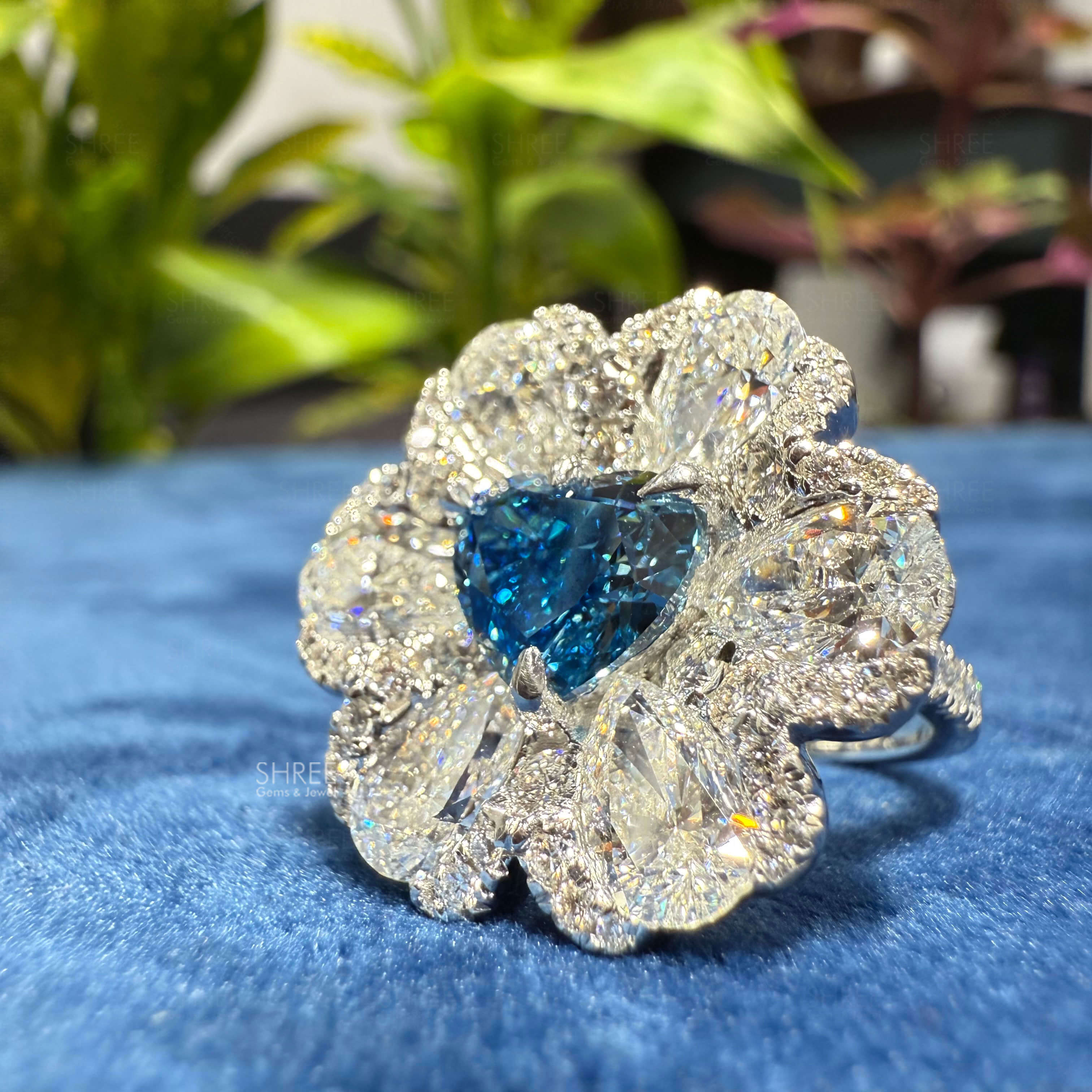side view of flower diamond engagement ring​