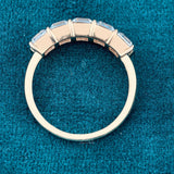 Close up vertical view of 5 Stone Emerald Cut Diamond Eternity Band​