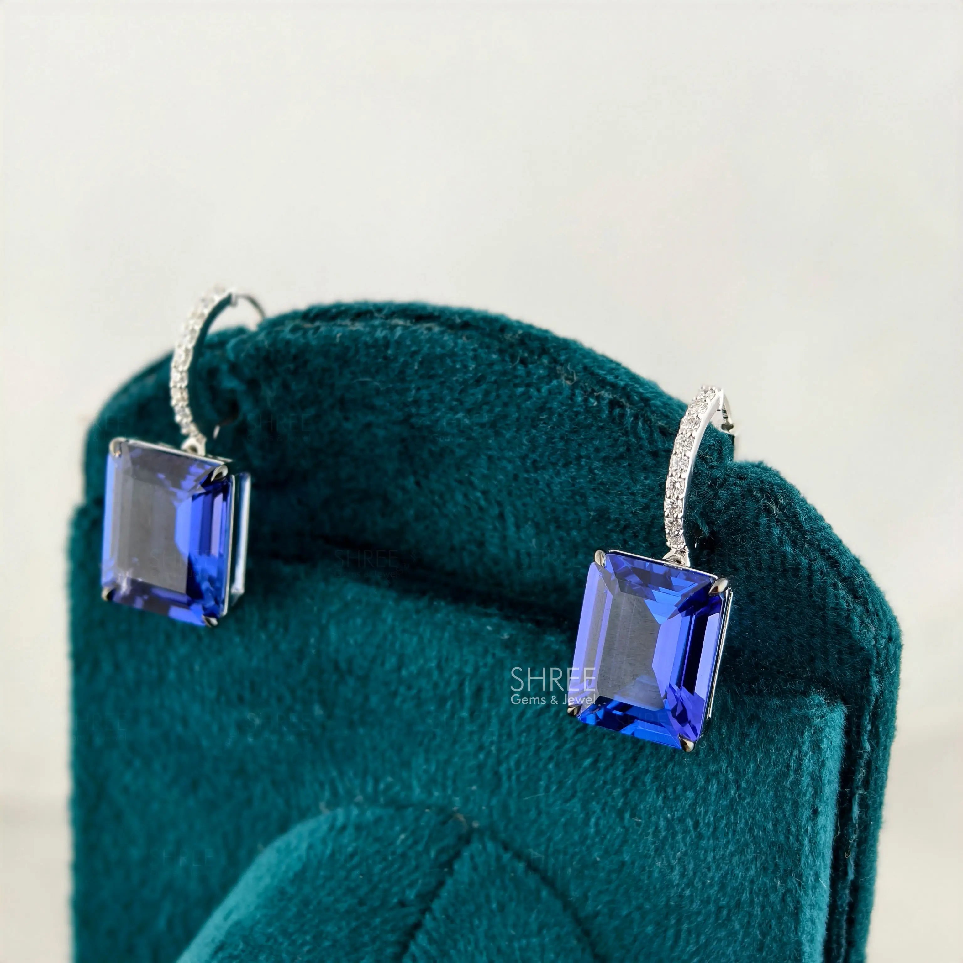 side view of gemstone drop earrings​