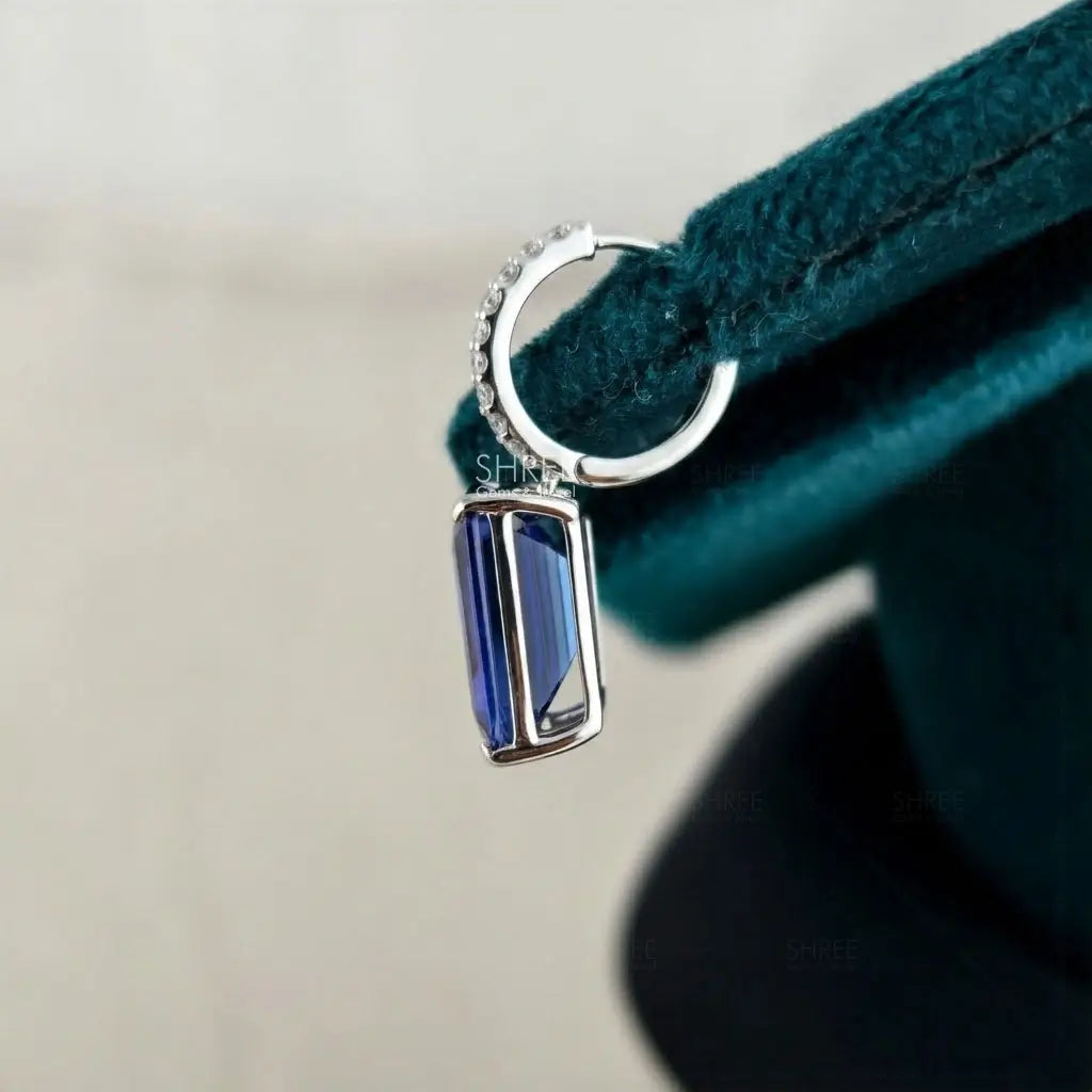 side view of blue gemstone earrings​
