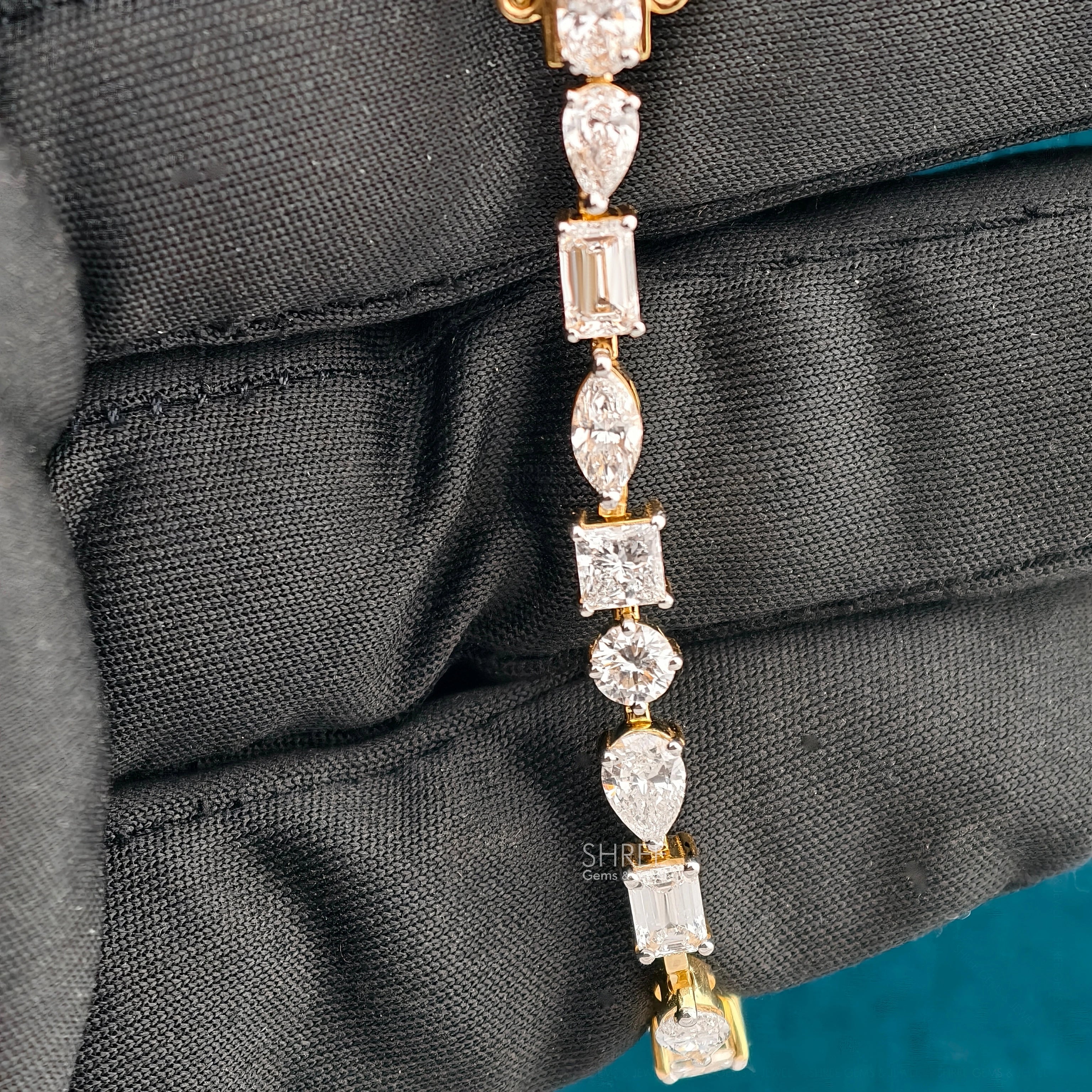 Bracelet Held with Glove View of Multi Shape Lab Grown Diamond Bracelet