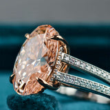 Closeup view of 7 Carat Oval Pink Diamond Halo Engagement Ring