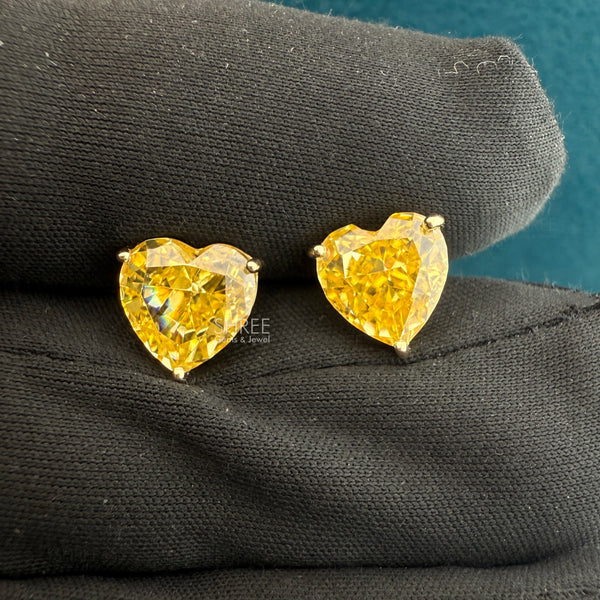 Close up Of 4 Ct Heart Cut Yellow Lab Grown Diamond Earrings