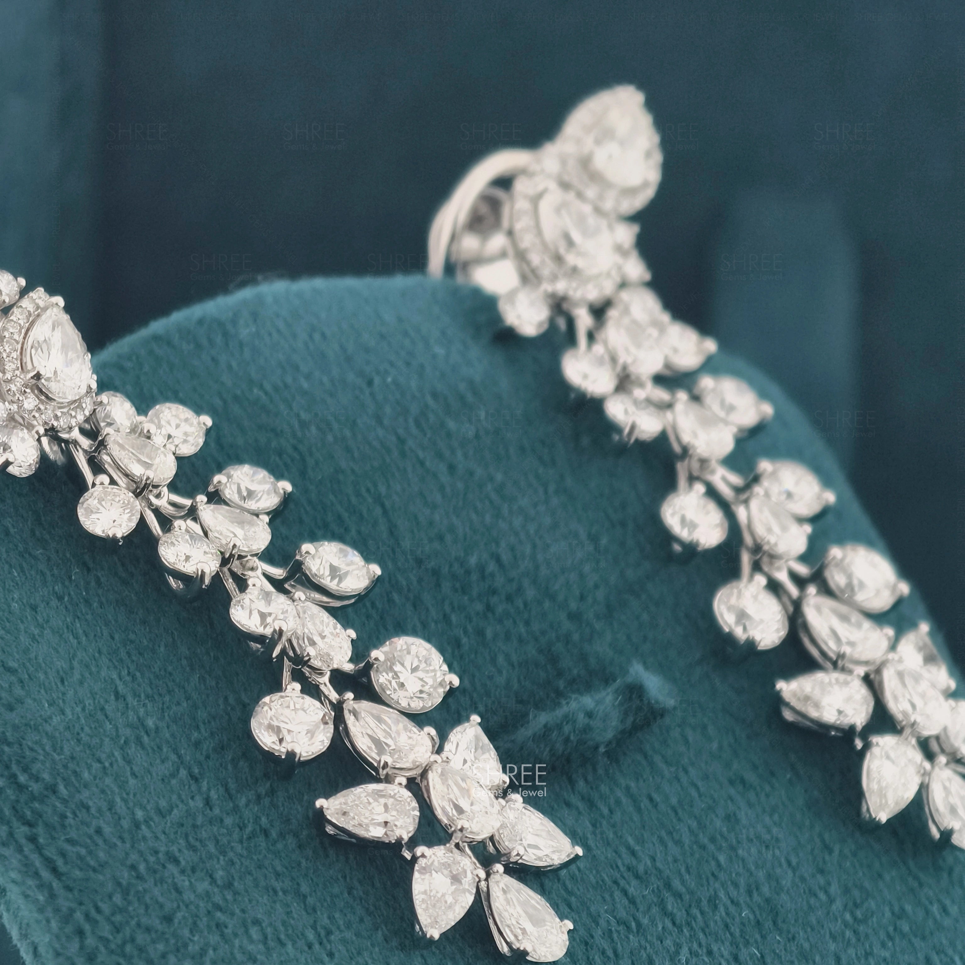 Side Angle of Pear Shaped Lab Grown Diamond Drop Earrings with Halo Design