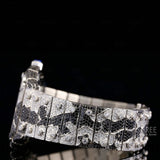 Side View of Black & White Skeleton Moissanite Watch – Fully Iced 41MM