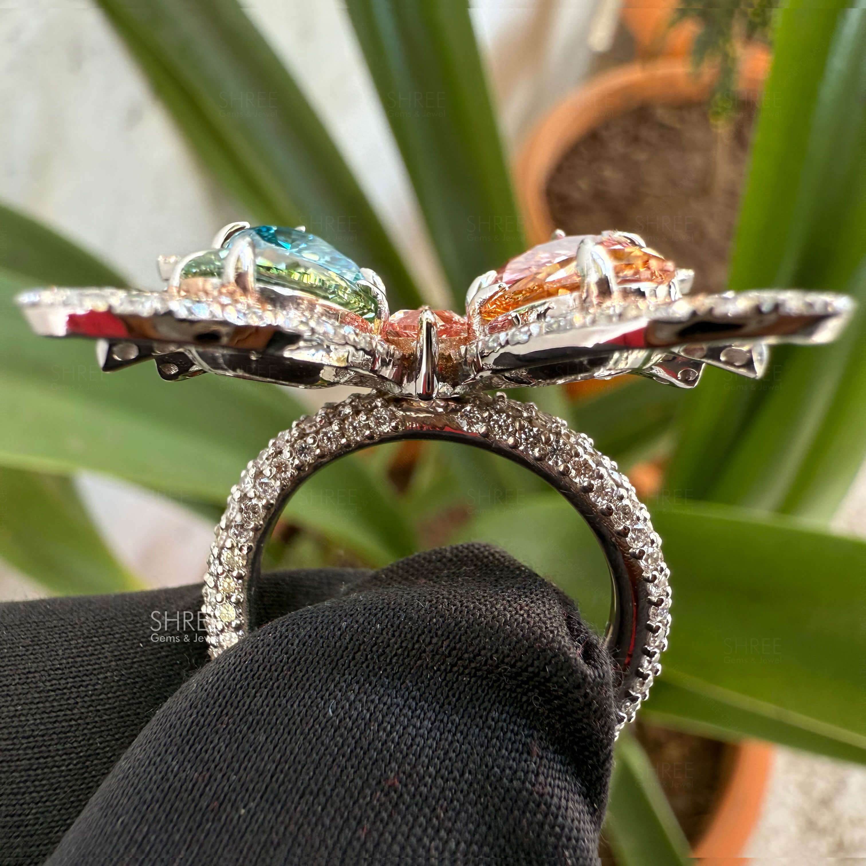 side view of butterfly diamond engagement ring​