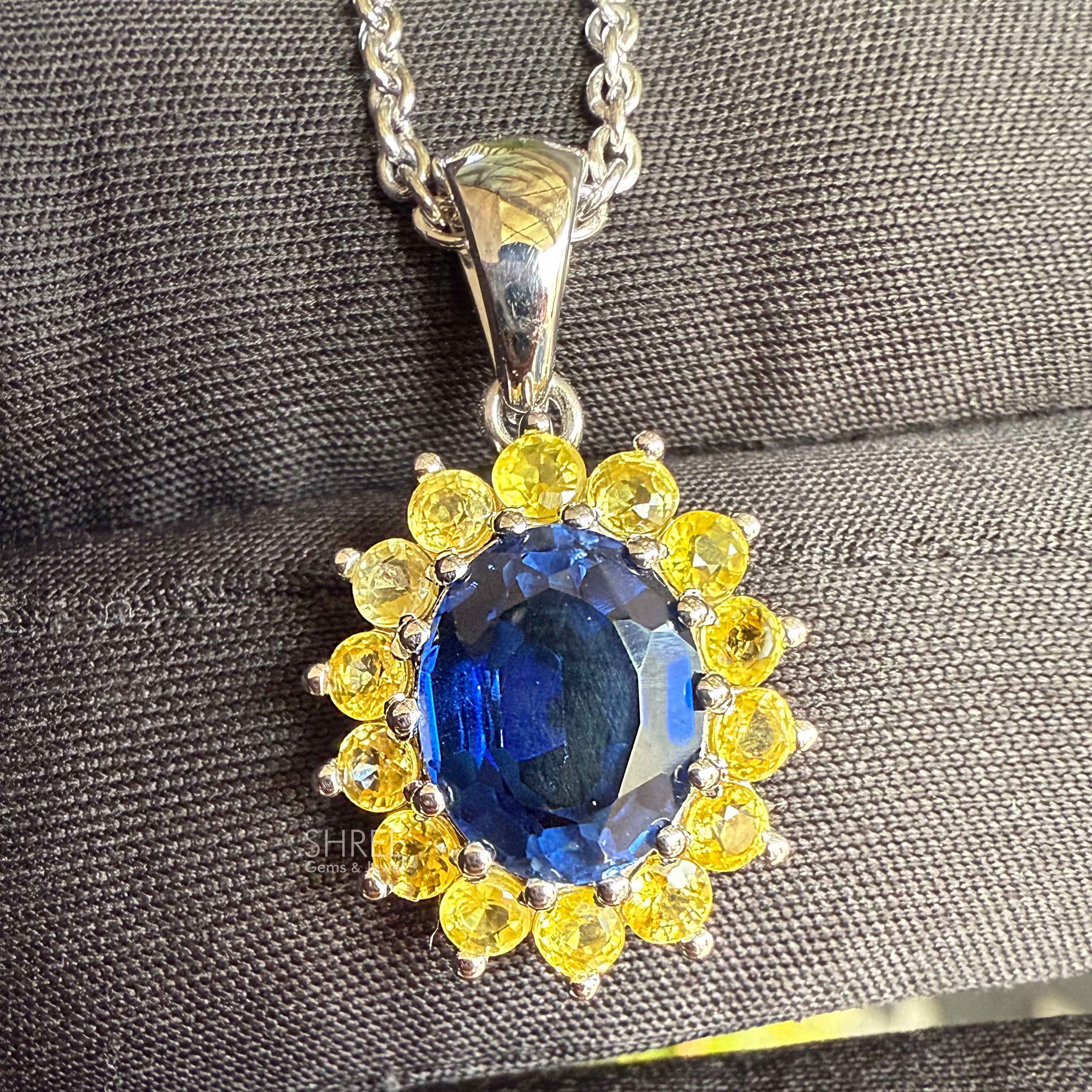 zoom view of sapphire and diamond pendant​