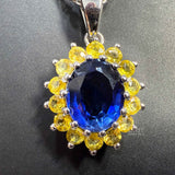 front view of Halo Design Sapphire and Diamond Pendant​