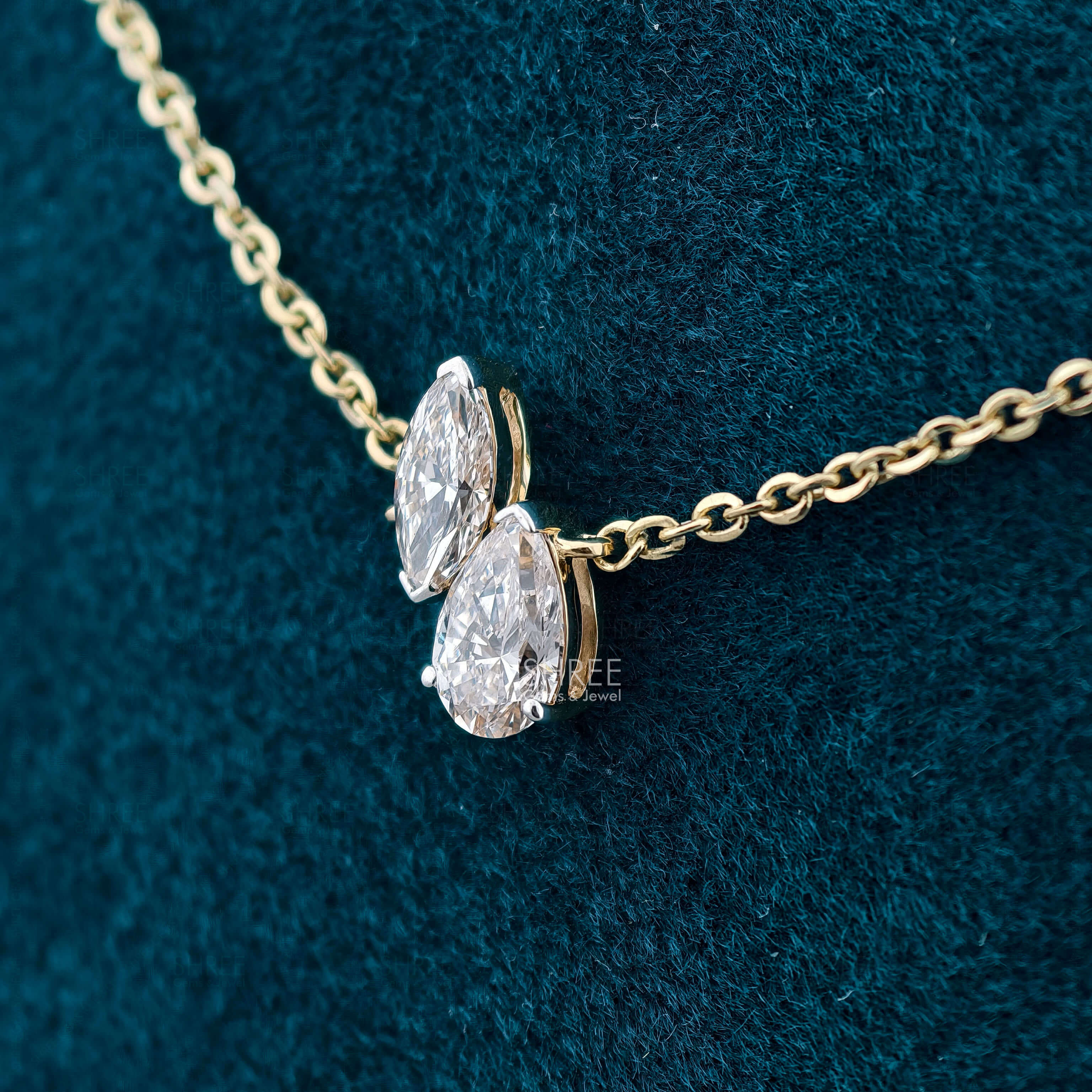 side view of toi et moi diamond necklace​