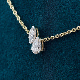 side view of toi et moi diamond necklace​