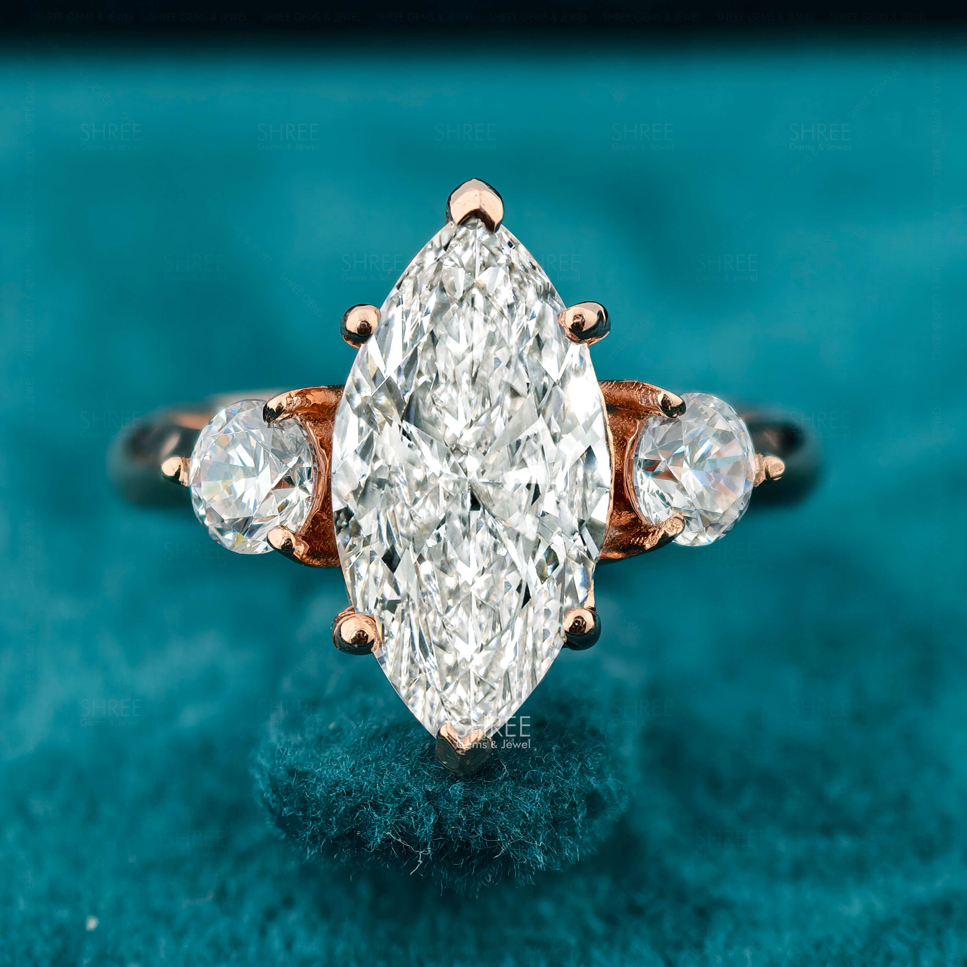 Front View of Marquise Cut Three Stone Engagement Ring