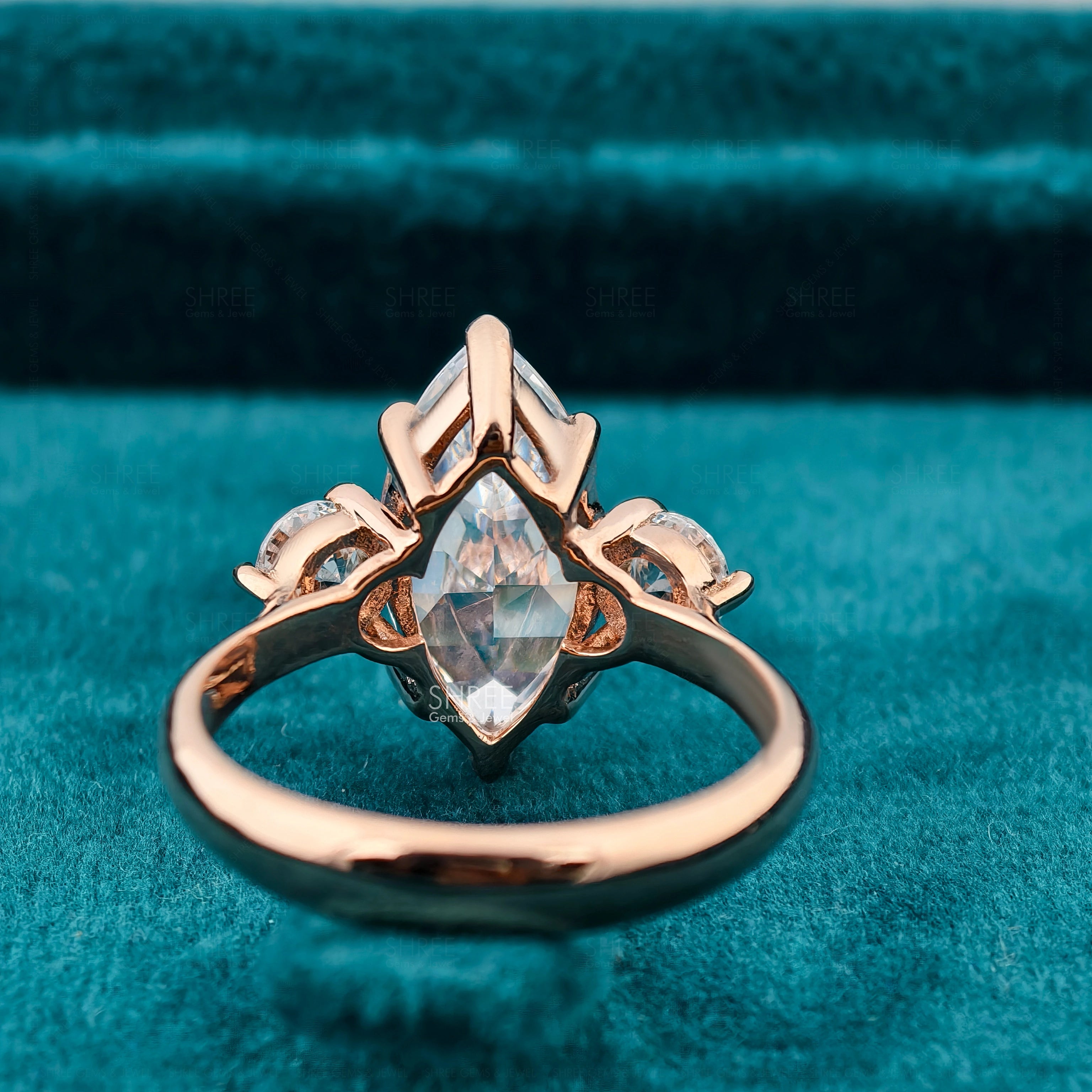 Back side view of Marquise Cut Three Stone Engagement Ring​