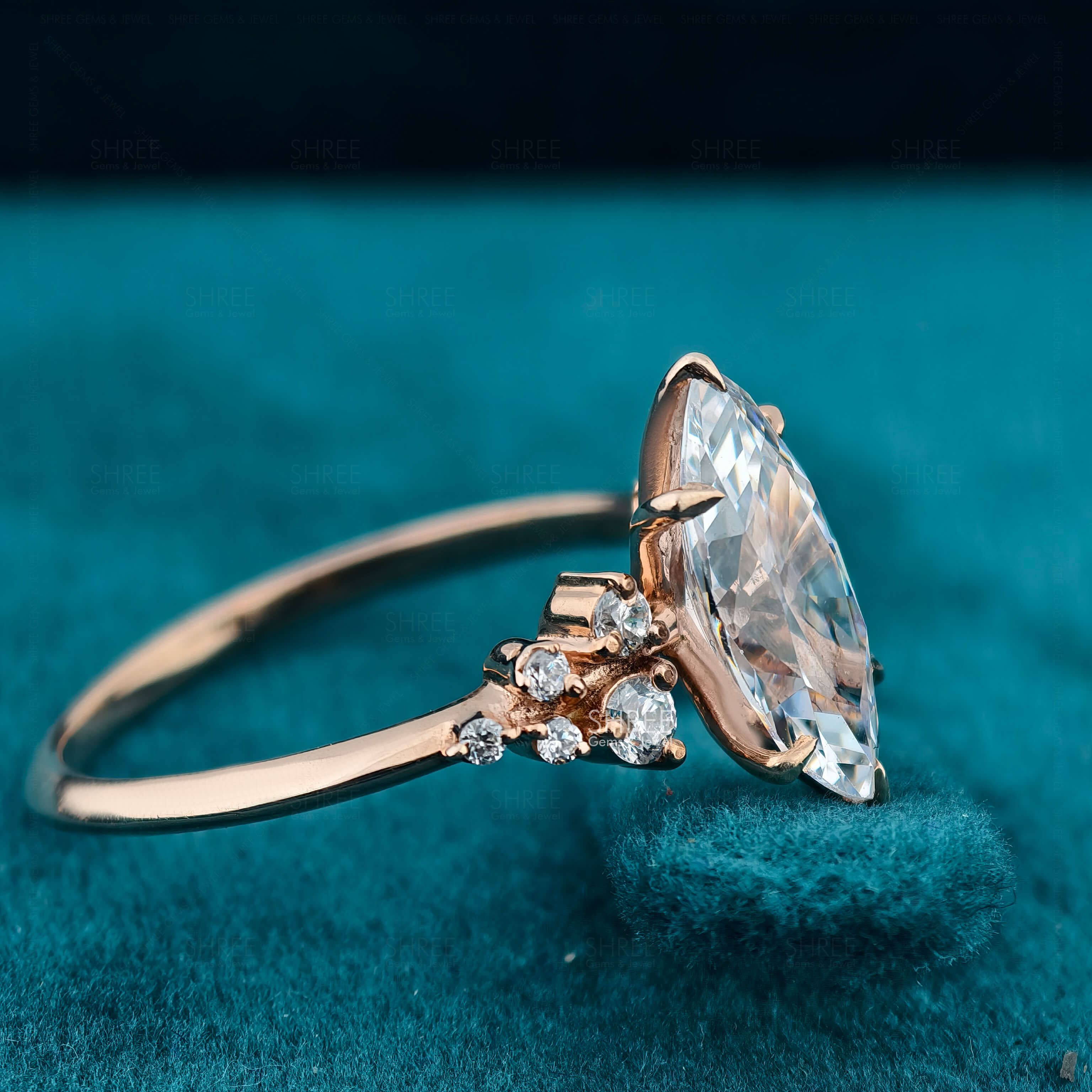 Side View Of Marquise Shaped Diamond Cluster Engagement Ring