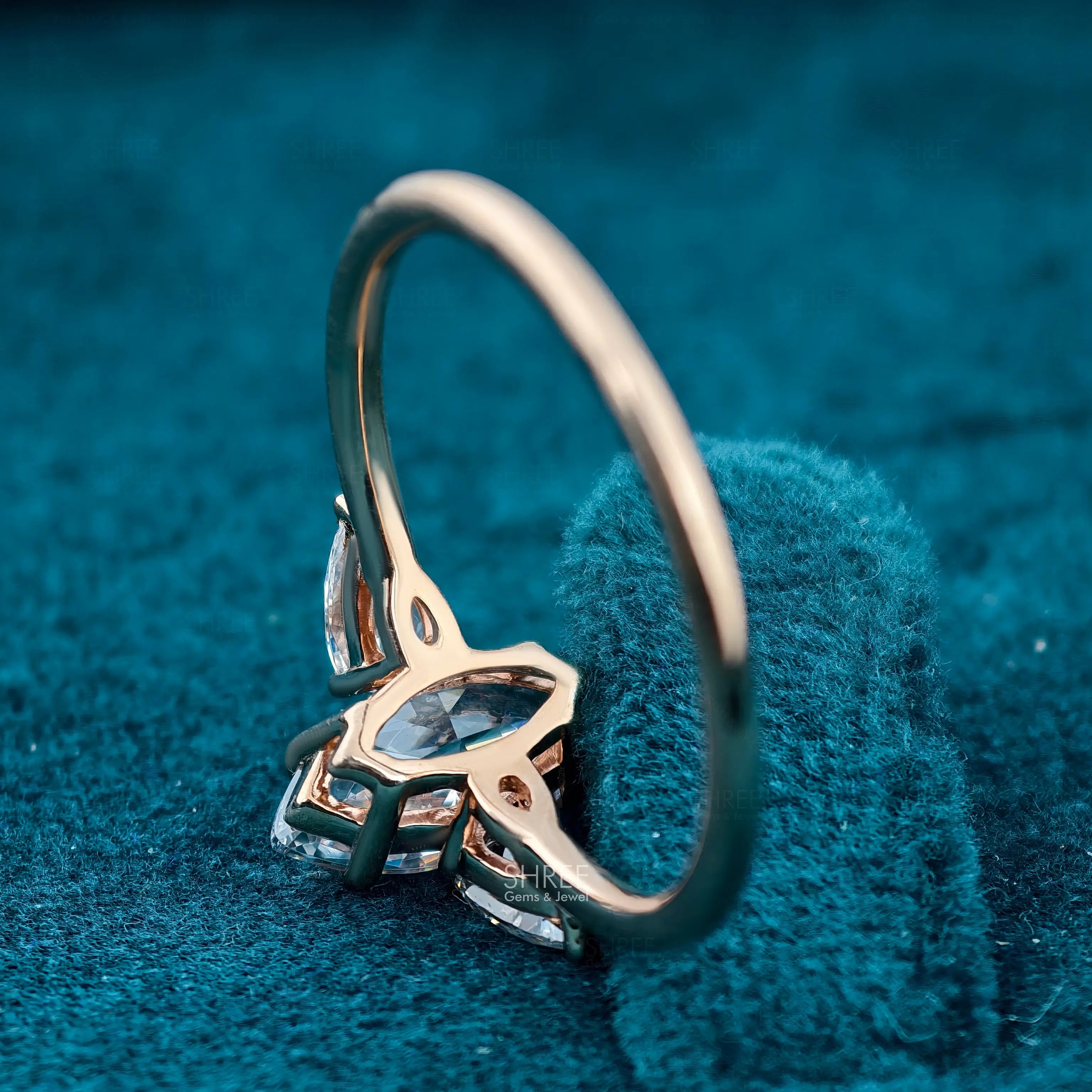 Back View of Marquise & Pear Cut Three Stone Lab Created Diamond Ring​