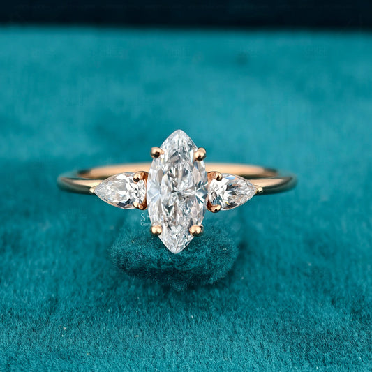 Front View of Marquise & Pear Cut Three Stone Lab Created Diamond Ring​