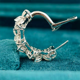 side view of diamond dangle earrings for women