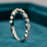 Close up view of Marquise and Round Diamond Eternity Ring​