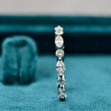 Side view of Marquise and Round Diamond Eternity Ring​