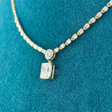 side view of radiant cut diamond necklace​
